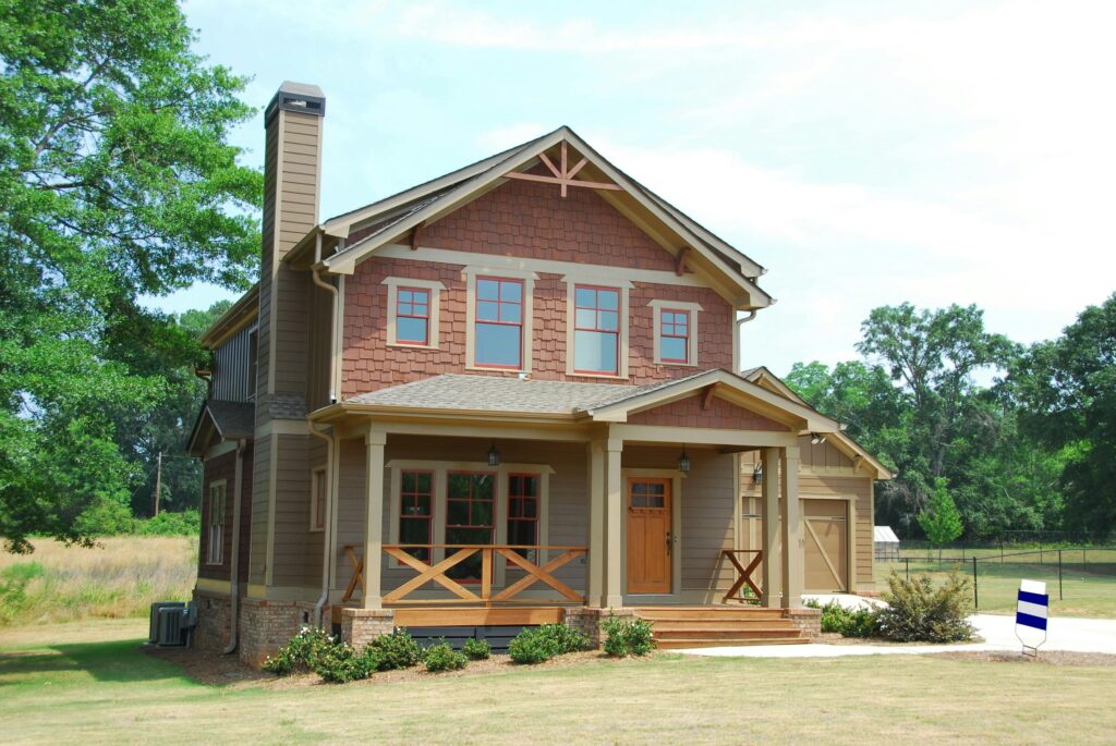 Brown 2-storey House Beside Tree